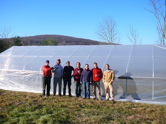 Work crew completing the hoophouse on a gorgeous Fall morning.